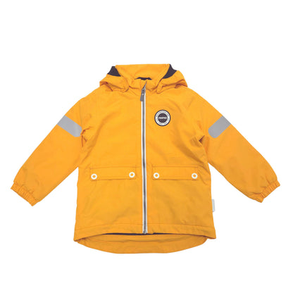 A bright yellow hooded shell jacket with reflective silver-gray stripes on the sleeves, a silver front zipper, and a circular black-and-white logo patch on the left chest, shown flat against a white background.