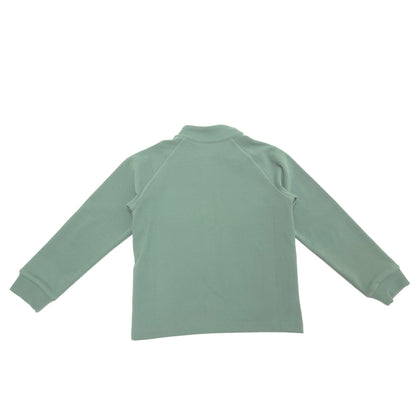 A sage green long-sleeve raglan turtleneck top shown from the back, laid flat against a solid white background.