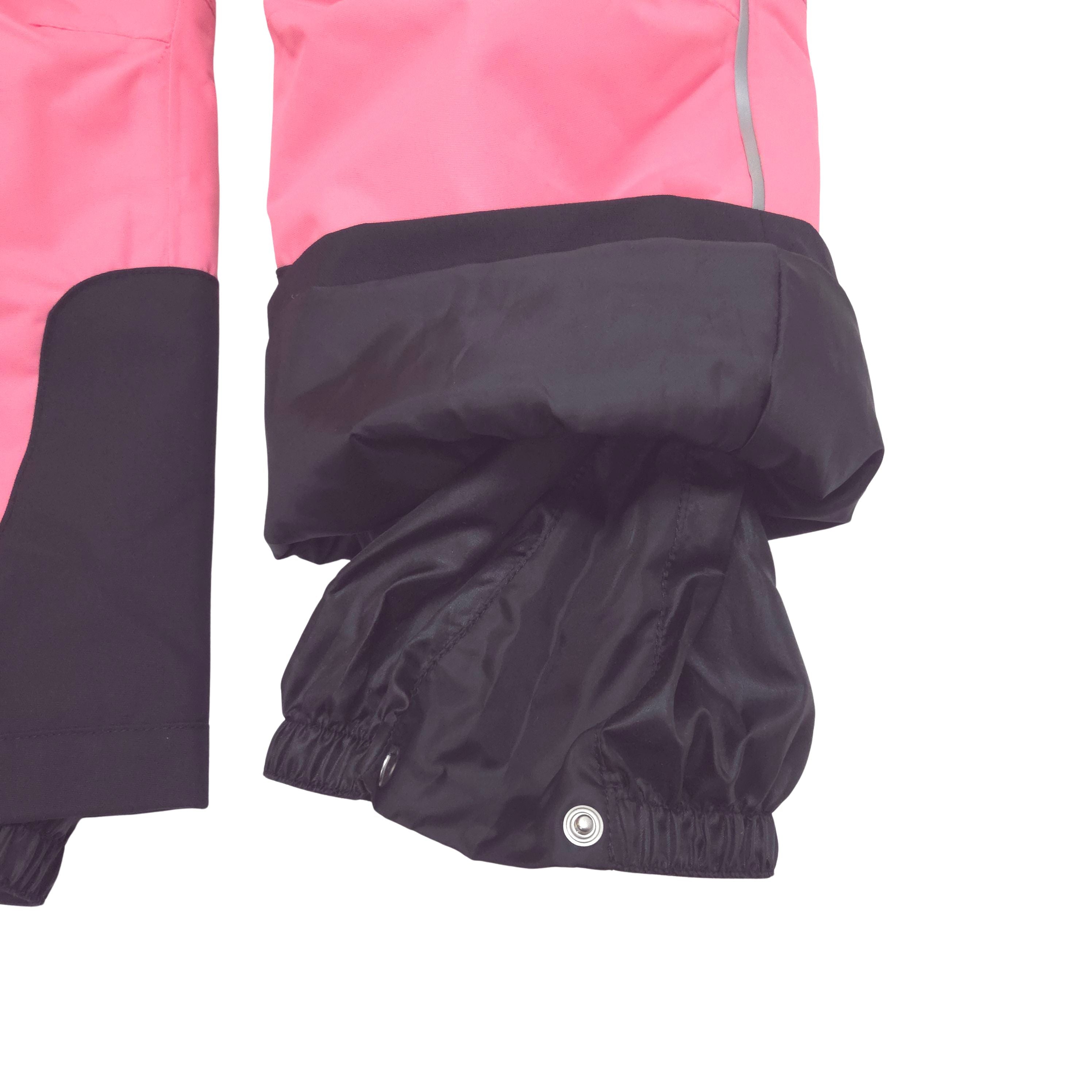 Internal gaiters at cuffs keep out snow; external scuff guards protect from boot- and ski-edge wear