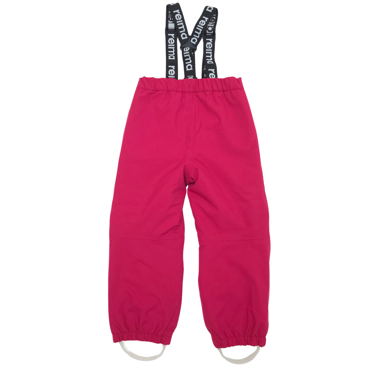 Bright pink children's snow pants with black adjustable suspenders printed with the brand name 'reima' in white, shown flat on a white background.