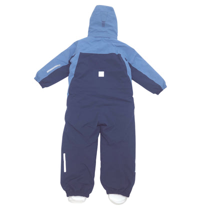 A hooded children's shell suit shown from the back, featuring a light blue upper section and hood, dark navy lower body, and white reflective striping on the sleeves and leg.