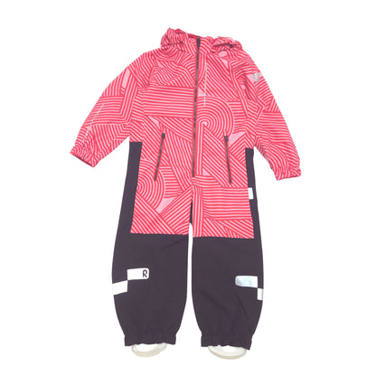 A children's hooded one-piece shell suit with a pink and red wavy geometric pattern on the upper body and sleeves, and solid dark charcoal/black lower legs with reflective white striping.
