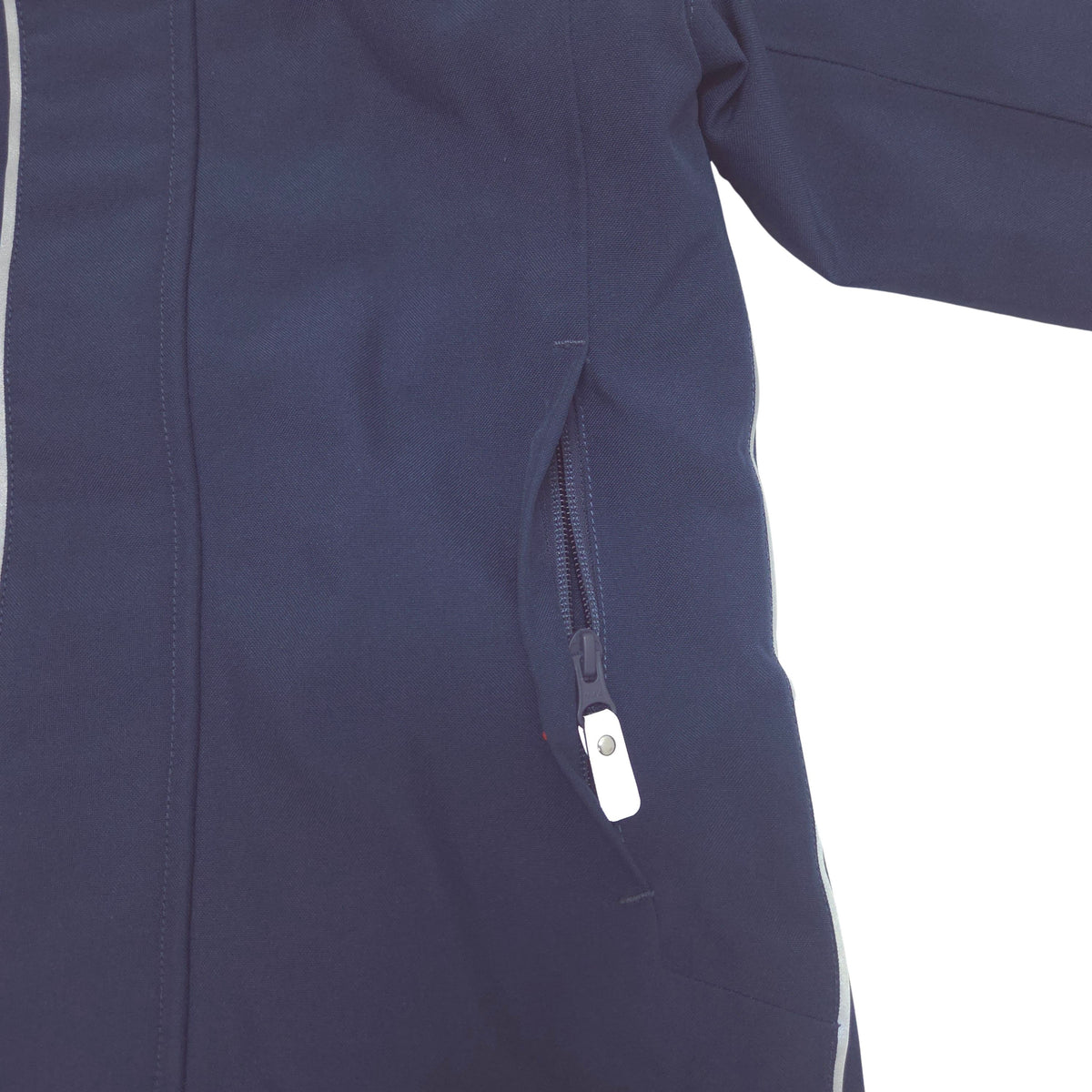 Close-up of a navy blue shell suit showing a side zip pocket with a white zipper pull, against a white background.