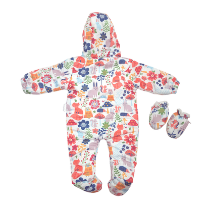 A baby footed one-piece snowsuit with a colorful woodland animal and floral print, shown with matching booties on a plain white background shown from back.