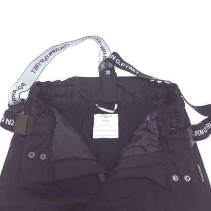Black insulated winter pants with a white and black branded elastic suspenders, shown against a plain white background.
