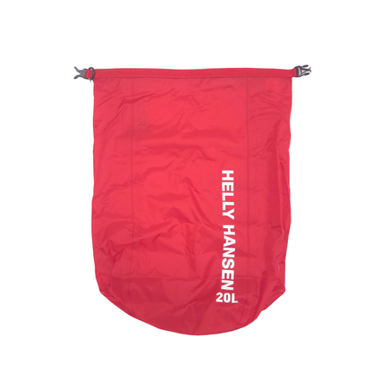 A red drawstring dry bag  by Helly Hansen, featuring the brand name printed vertically in white on the right side, shown against a plain white background.