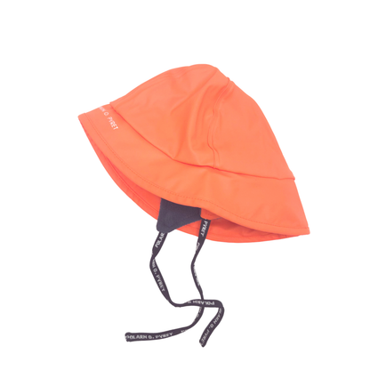 A bright orange rain hat with a black chin strap featuring white brand name, shown on a plain white background.
