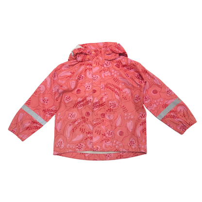 A children's hooded rain jacket in a coral pink and red botanical pattern, featuring reflective silver-gray stripes on the sleeves, shown flat on a white background.