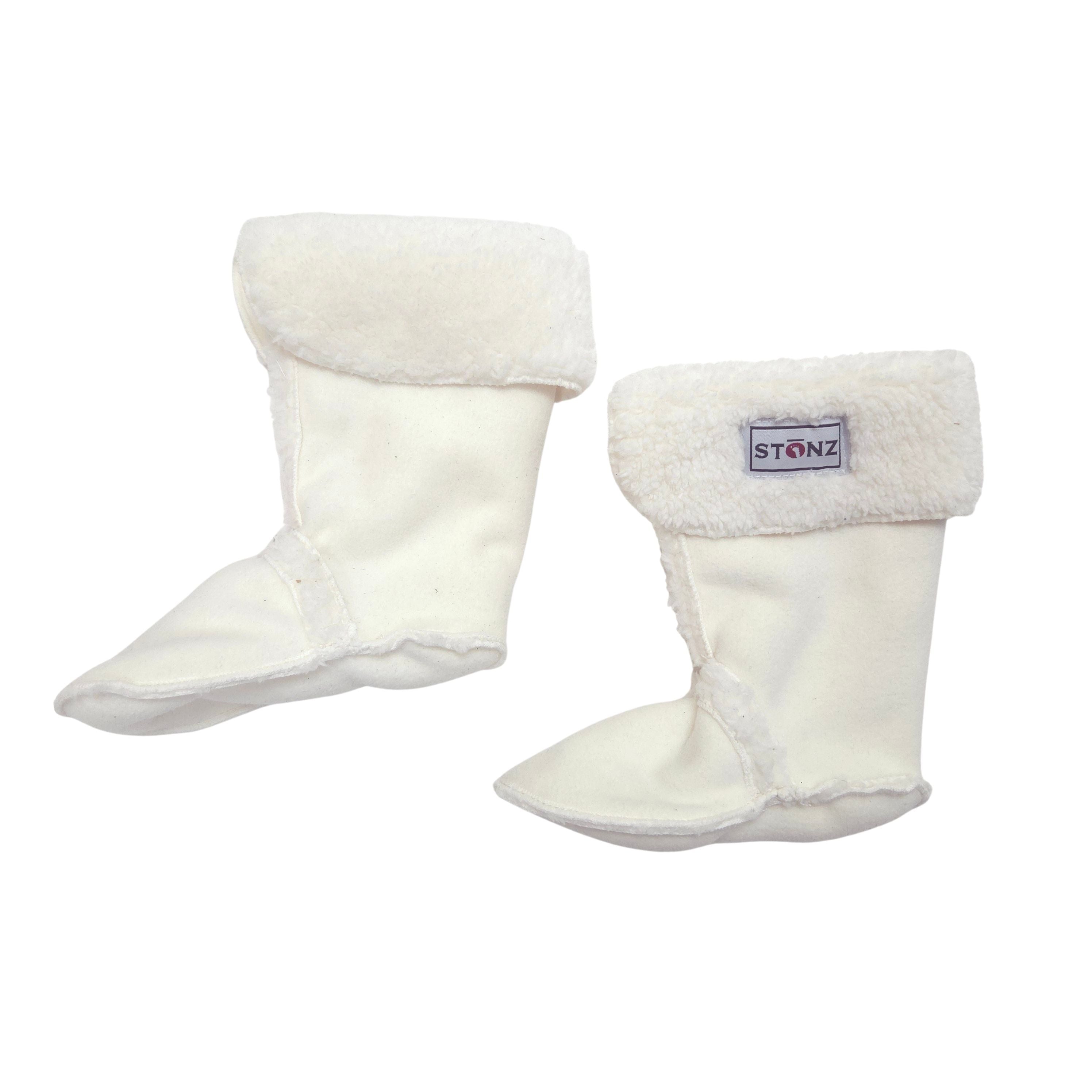 A pair of white boot  liner with soft white faux-fur trim at the top, shown on a plain white background. One boot has a visible brand label that reads 'STONZ'.
