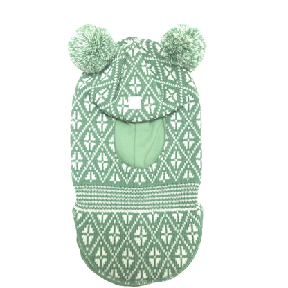 A green and white patterned knit balaclava with two pom-poms on top, shown against a plain white background.
