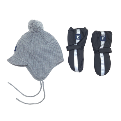 A winter accessory set featuring a light gray ribbed knit pom-pom hat with ear flaps and long ties, alongside a pair of black winter mittens with reflective silver stripes and blue brand tags.