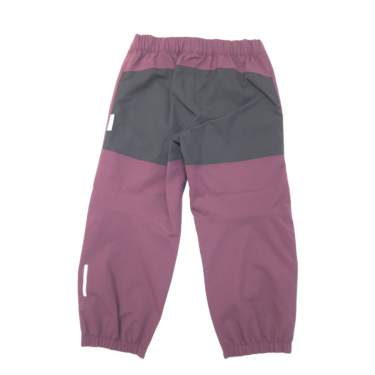 A pair of color-blocked children's pants in dusty purple and black, shown from the back on a white background.
