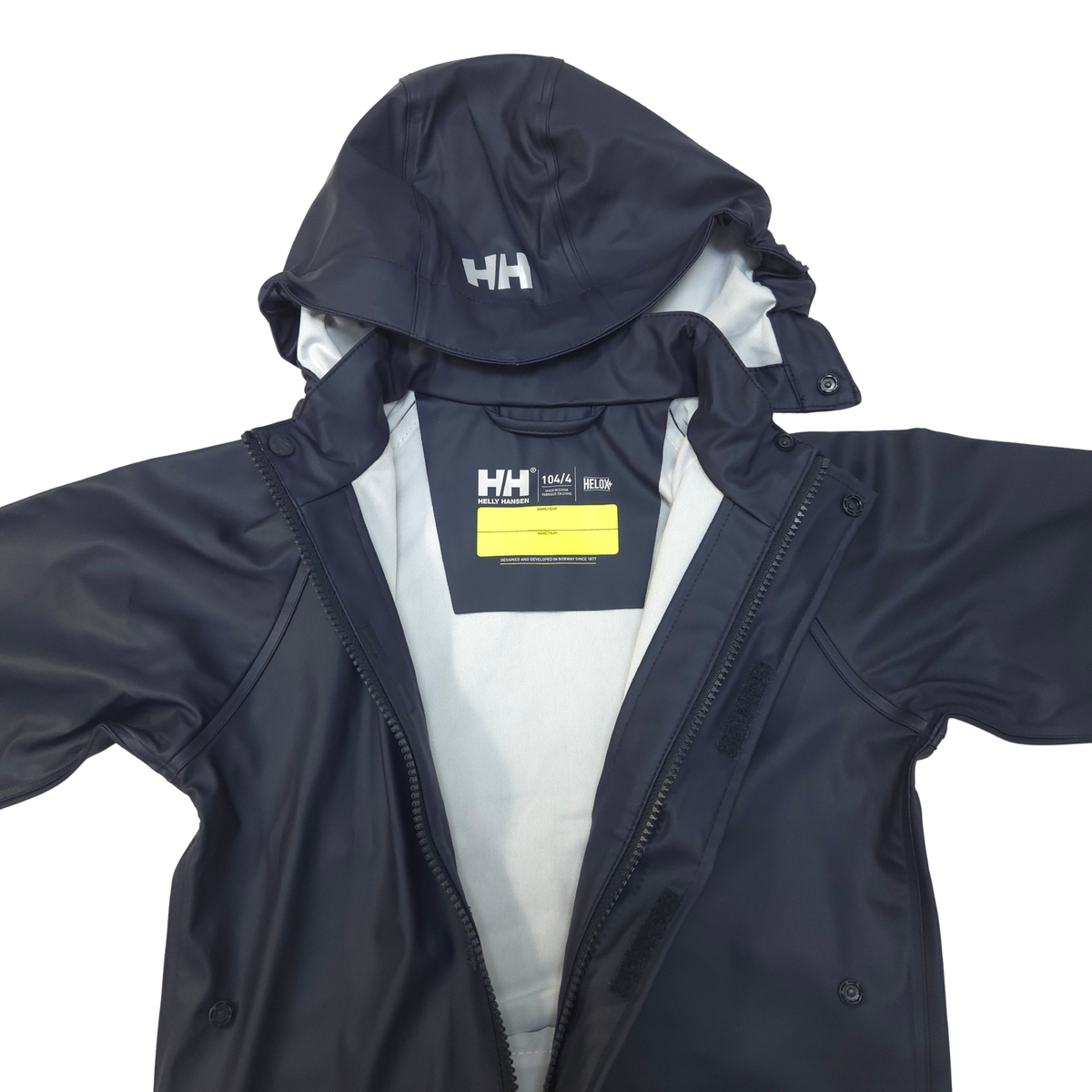 A navy blue Helly Hansen rain suit with a hood, shown open to reveal a light gray interior lining and a yellow brand label inside the collar, set against a plain white background.
