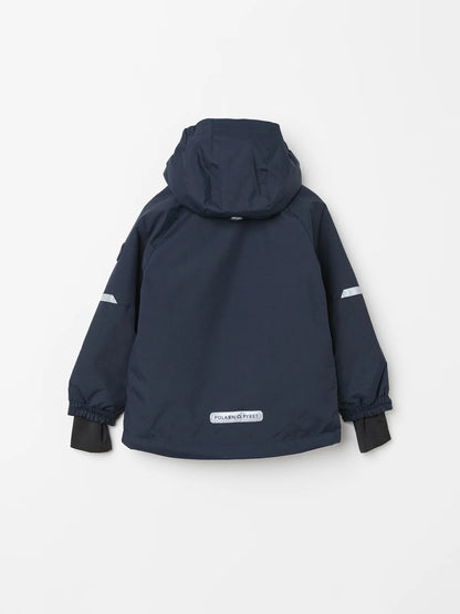 A navy blue Polarn O. Pyret winter hooded jacket shown from the back, featuring white reflective stripes on the sleeves and a white 'roundedtrail' brand patch near the bottom hem, displayed on a clean white background. 
