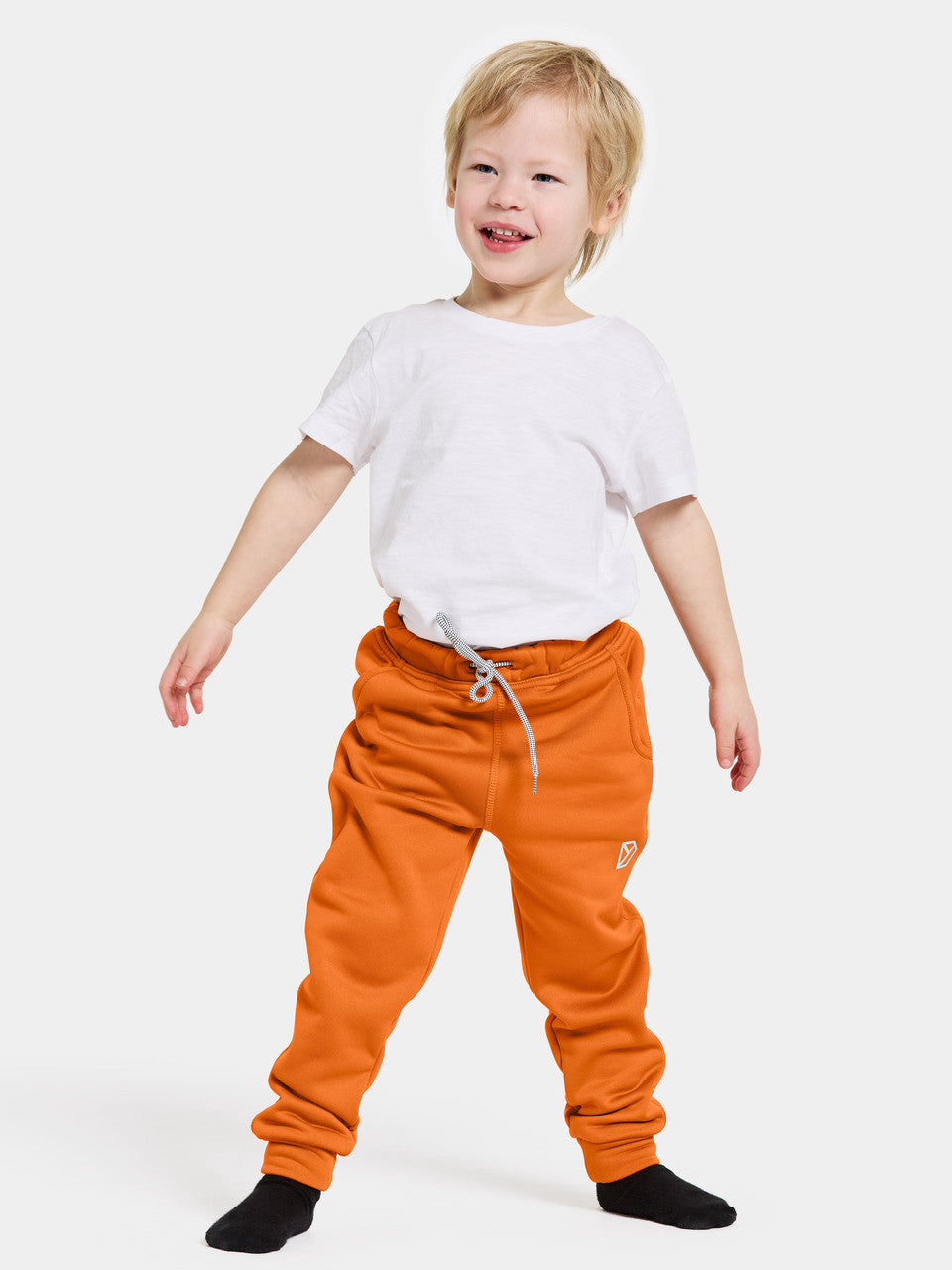 corin-technical-mid-layer-pants | #color_orange-jam
