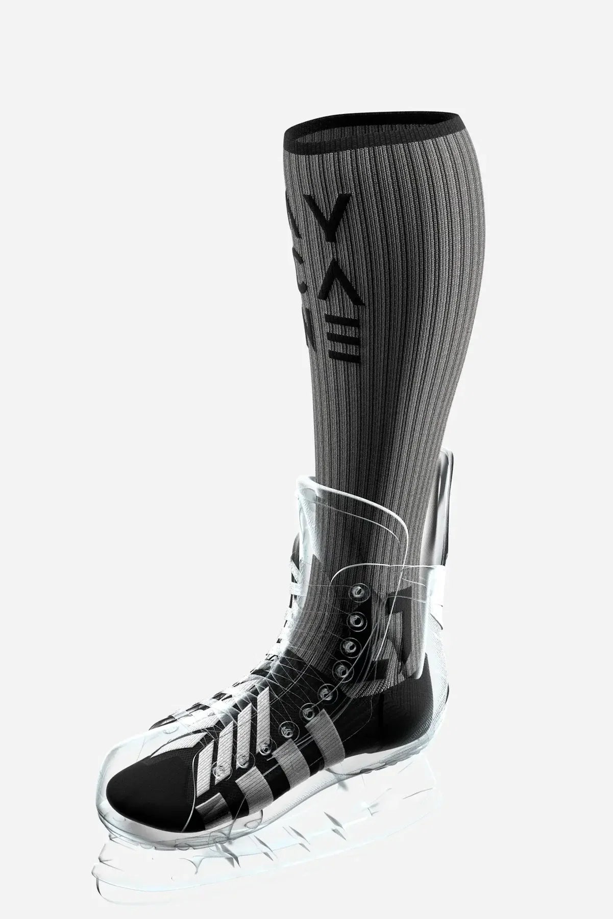 A black and gray ribbed knee-high athletic sock with a black logo, shown paired with a transparent and black ski boot on a light gray background.